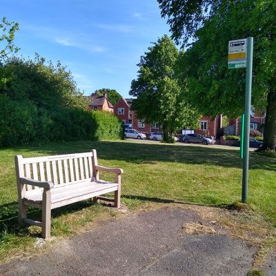 Bustop south end of the village